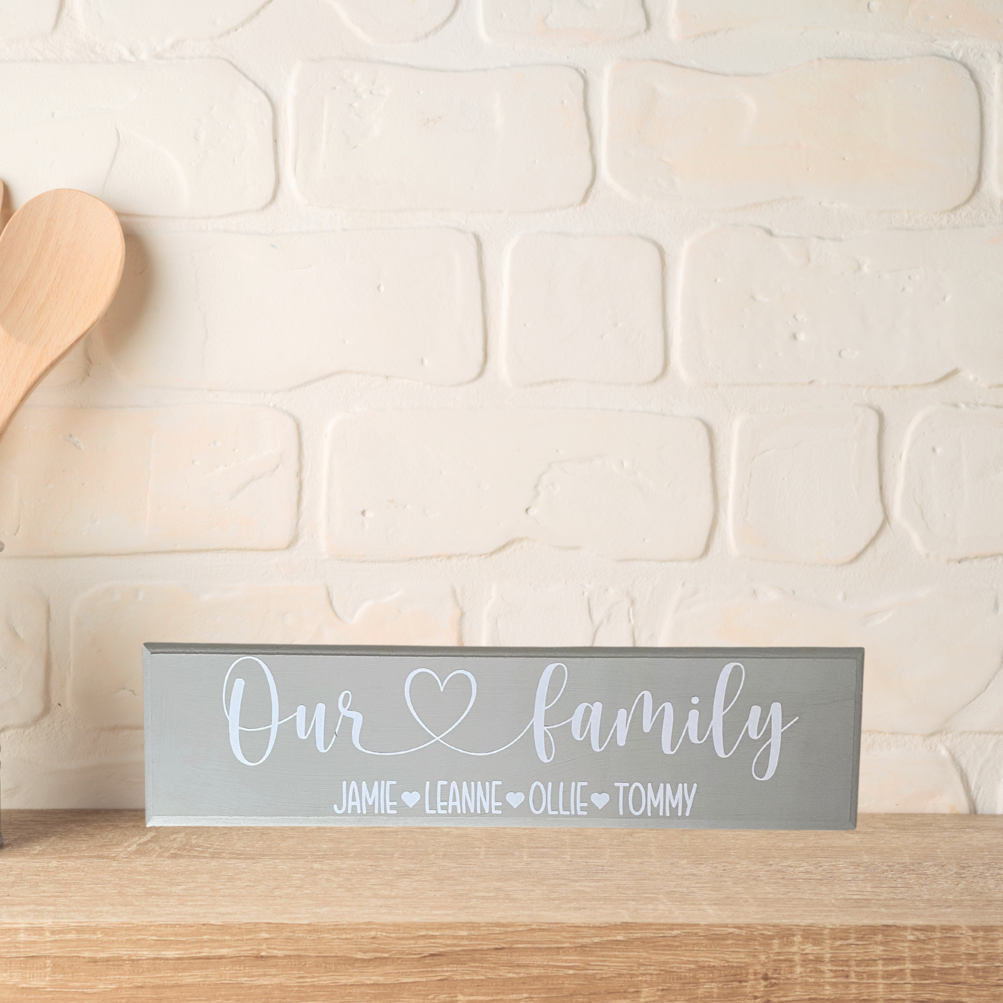 grey wooden personalised sign with family names