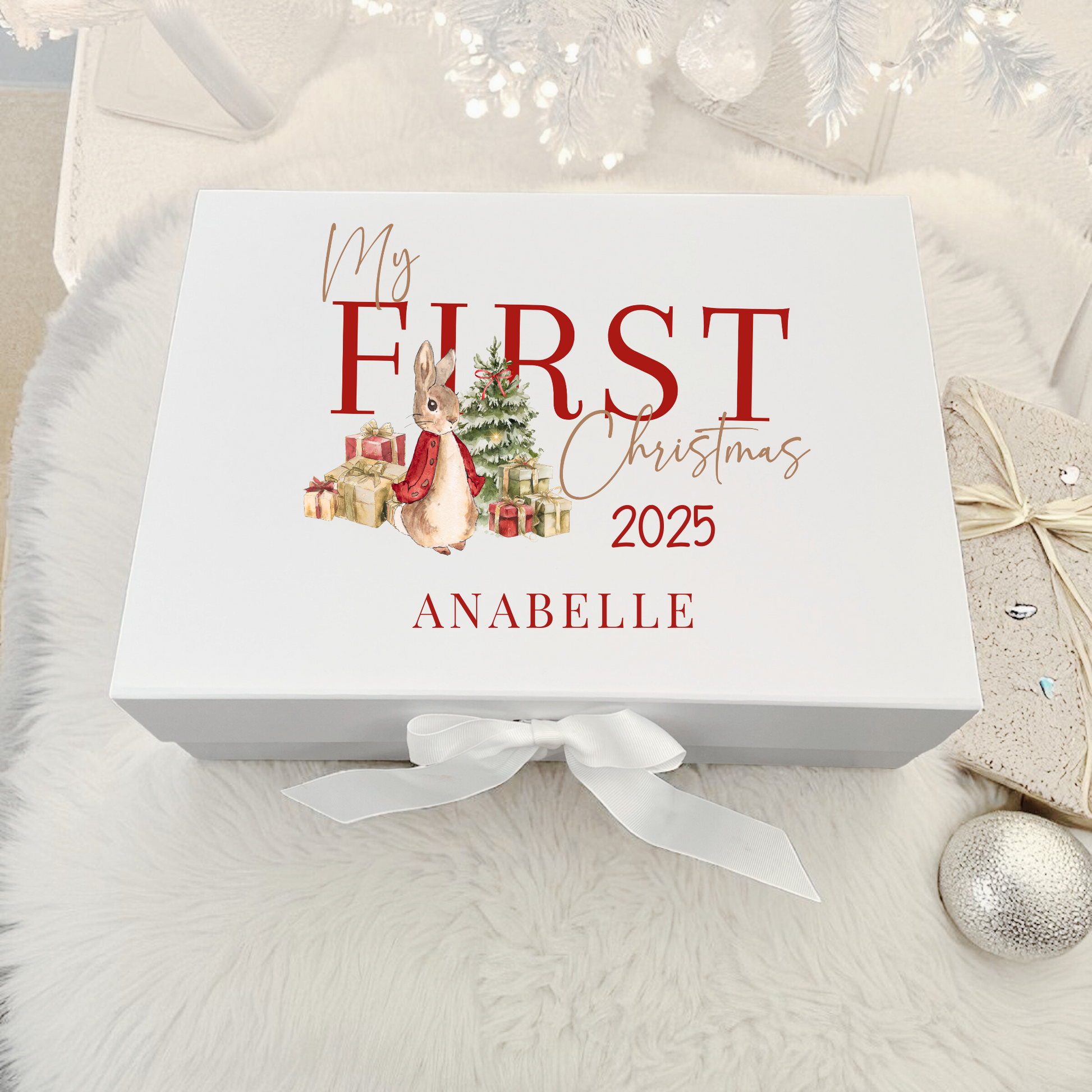 White personalised Christmas Eve box with magnetic close lid and white ribbon, perfect for holding pyjamas, treats and festive gifts.